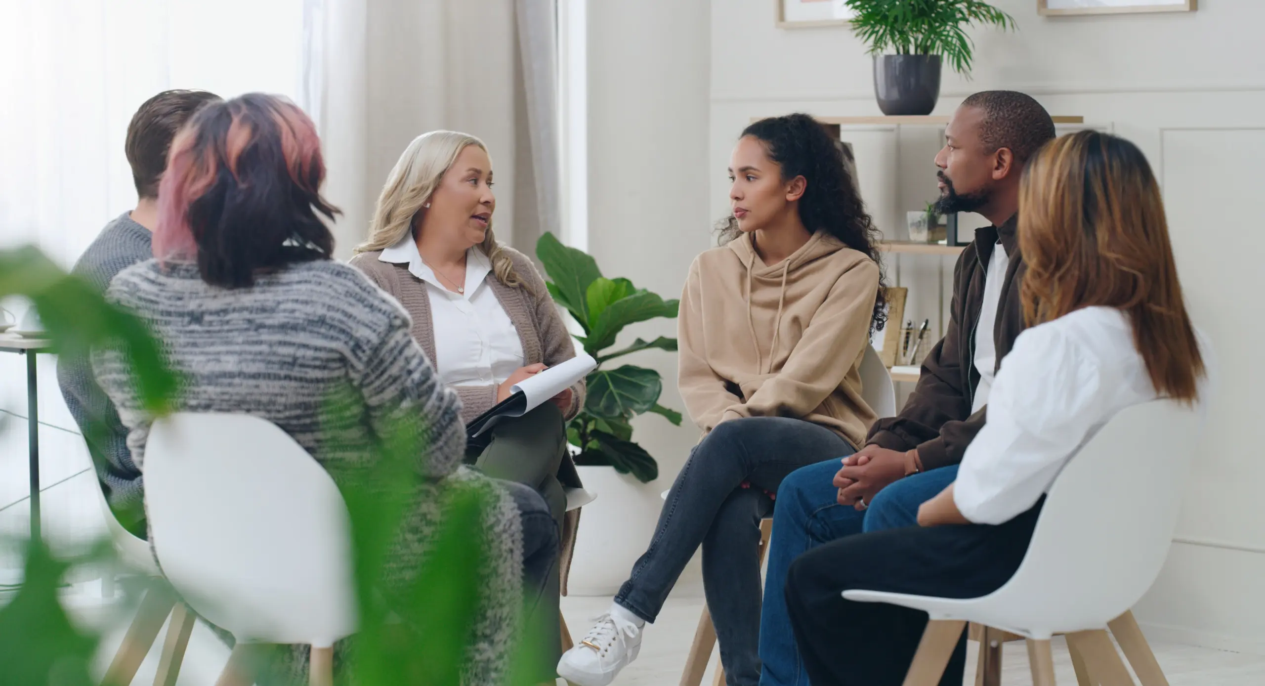 Who to contact if a friend needs help with addiction — supportive guidance session